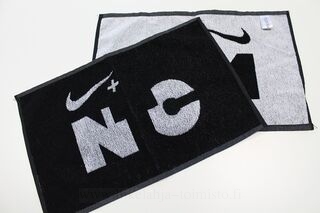 Towel with woven logo